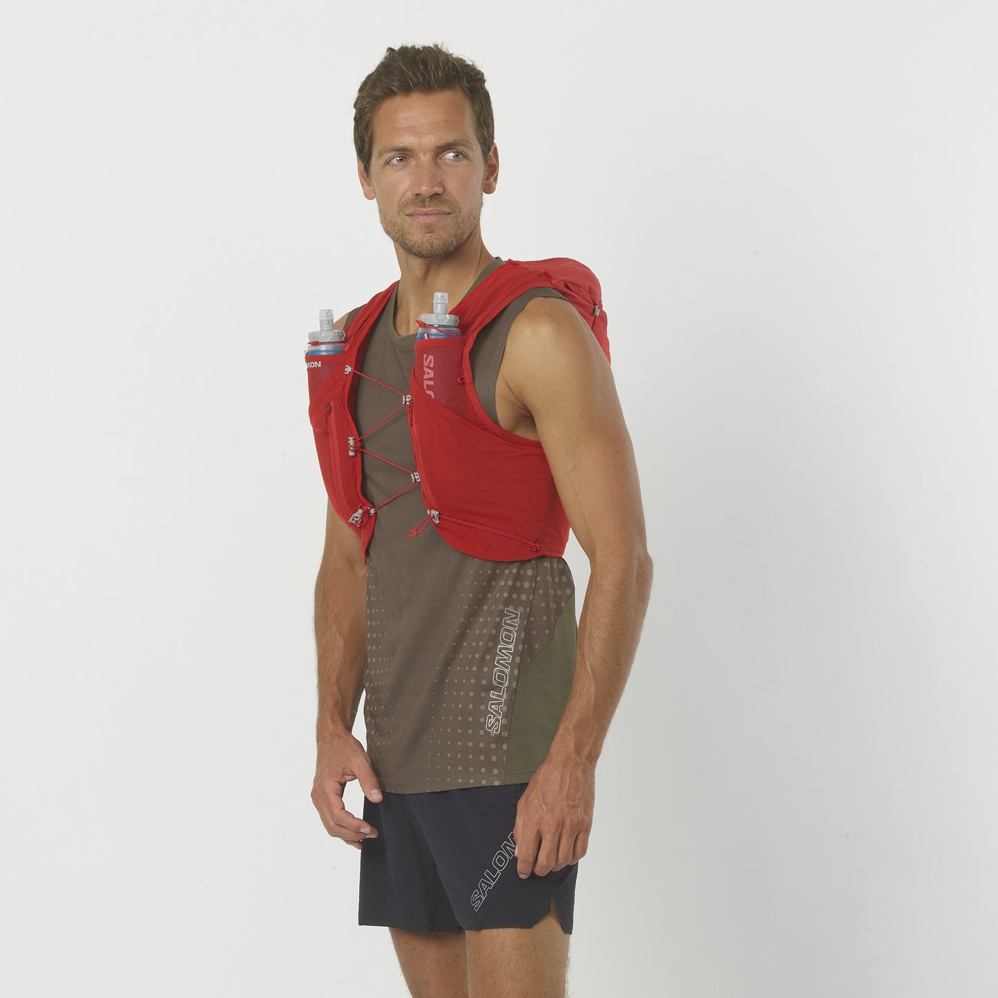 ADV SKIN 12 WITH FLASKS Unisex Trail Running Vest in Goji Berry