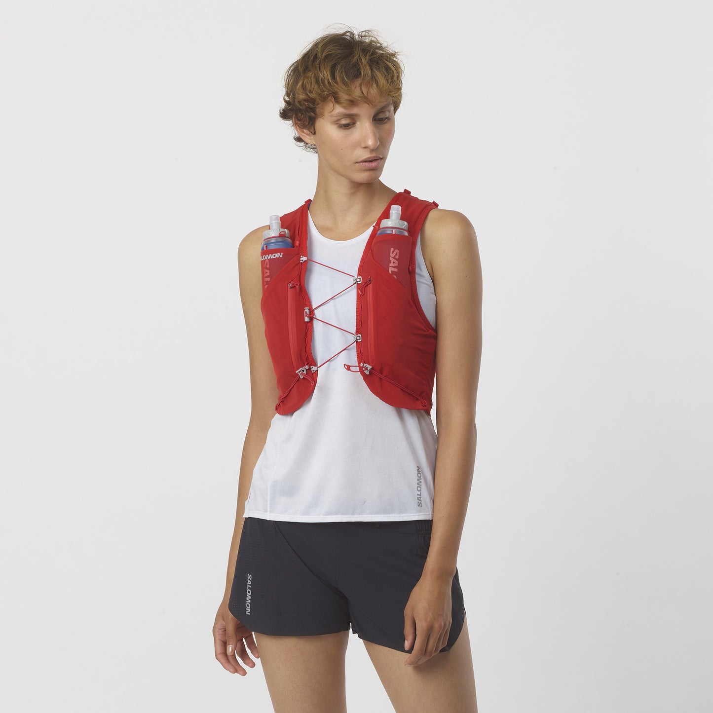 ADV SKIN 12 WITH FLASKS Unisex Trail Running Vest in Goji Berry